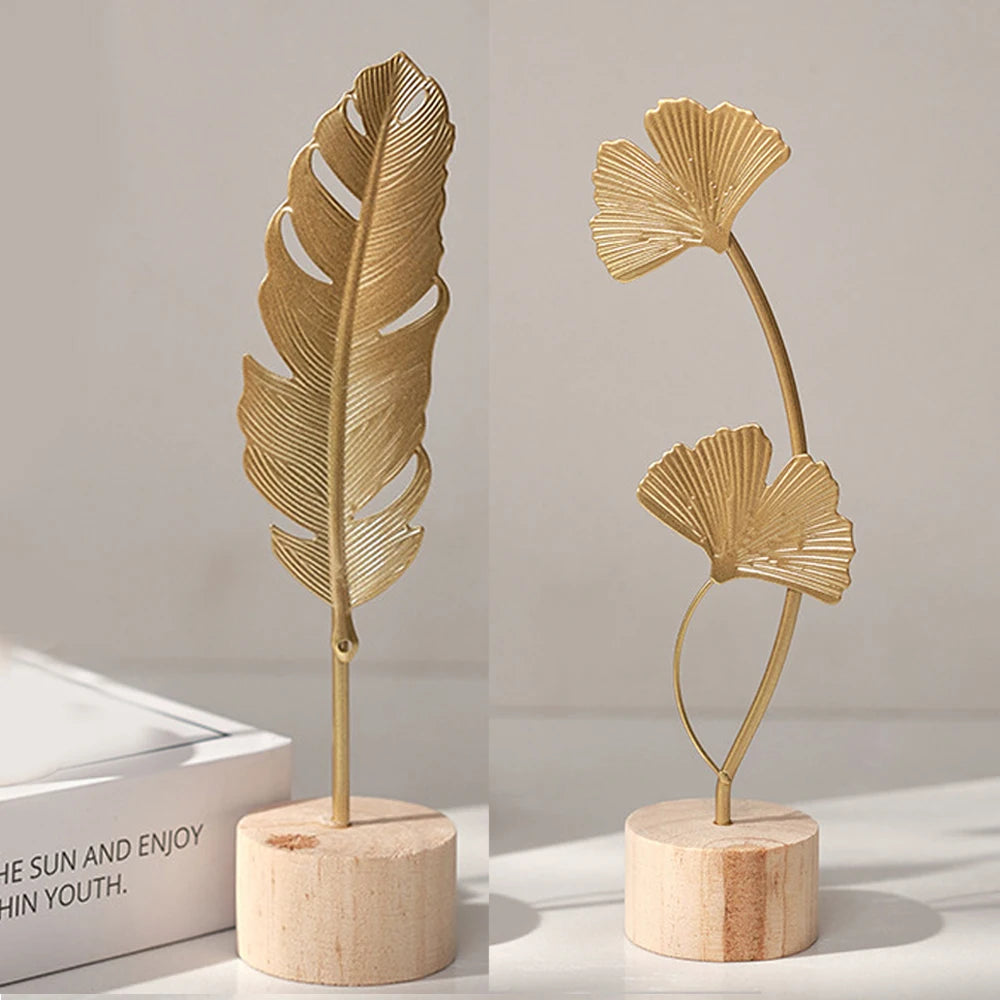 Escultura de folhas douradas para decoração